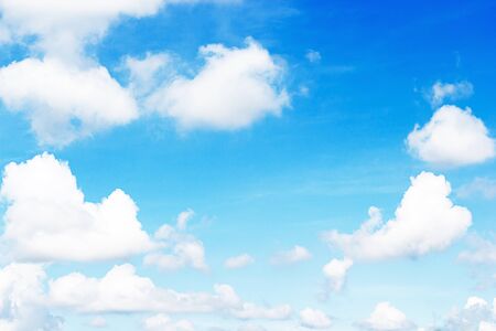 Blue sky and soft white clounds and empty space for your design.の写真素材