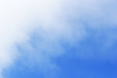 Blue sky background and white clouds soft focus, beautiful of nature.の写真素材