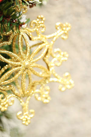 Christmas star decoration closeup on tree and empty space.の写真素材