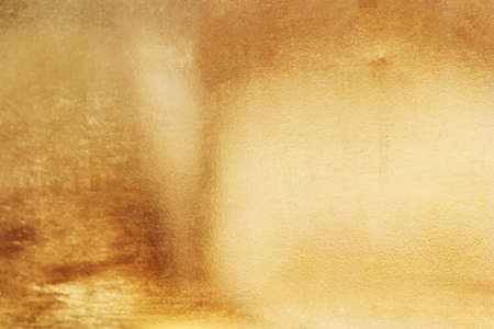 Gold abstract background or texture and gradients shadow.の写真素材
