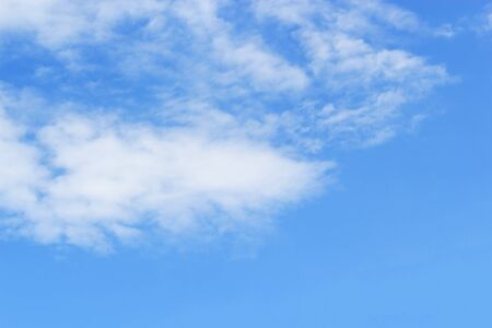 Soft white clouds against blue sky background for your design, beautiful of nature.の写真素材