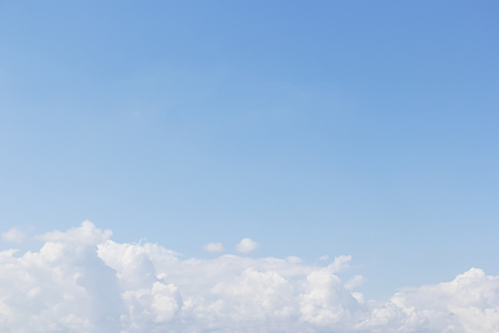 Blue sky background and white clouds soft focus, and empty space.の写真素材