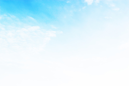 Blue sky background and white clouds soft focus, and empty space.の写真素材