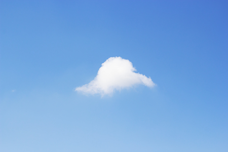 Blue sky background and white clouds single soft focus, and empty space.の写真素材