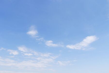 Blue sky background and white clouds soft focus, and empty space.の写真素材