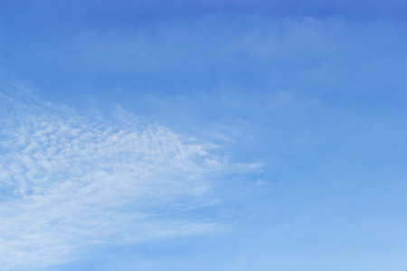 Blue sky and soft white clounds and empty space for your design.の写真素材