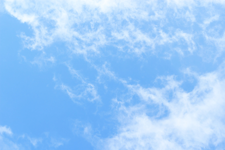 Blue sky background and white clouds soft focus, beautiful of nature.の写真素材