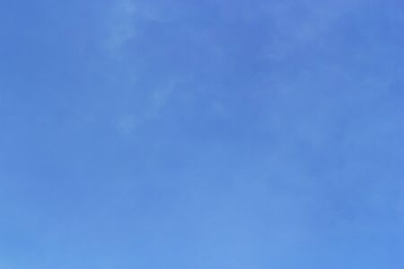Blue sky background and white clouds soft focus, and empty space.の写真素材