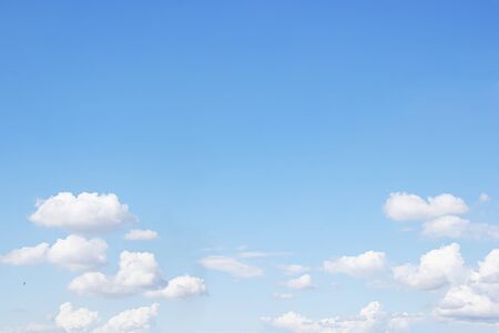 Blue sky background and white clouds soft focus, and empty space.の写真素材