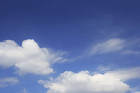 Blue sky background and white clouds soft focus, and empty space.の写真素材