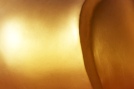 Gold abstract background or texture and gradients shadow.の写真素材