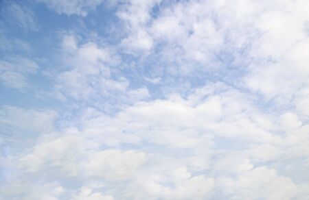 Blue sky background and white clouds soft focus, beautiful of nature.の写真素材