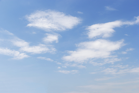 Blue sky background and white clouds soft focus, and empty space.の写真素材