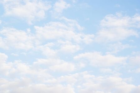 Blue sky background and white clouds soft focus, beautiful of nature.の写真素材