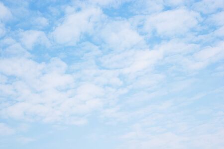 Blue sky background and white clouds soft focus, beautiful of nature.の写真素材
