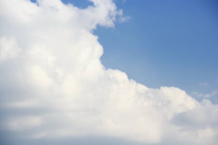 Blue sky background and white clouds soft focus, beautiful of nature.の写真素材