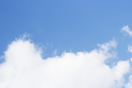 Blue sky background and white clouds soft focus, and empty space.の写真素材