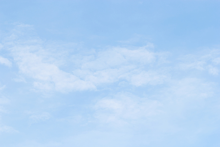 Blue sky background and white clouds soft focus, and empty space.の写真素材