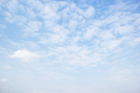 Blue sky background and white clouds soft focus, and empty space.の写真素材