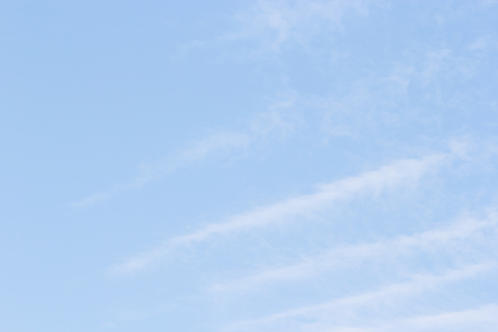 Blue sky background and white clouds soft focus, and empty space.の写真素材