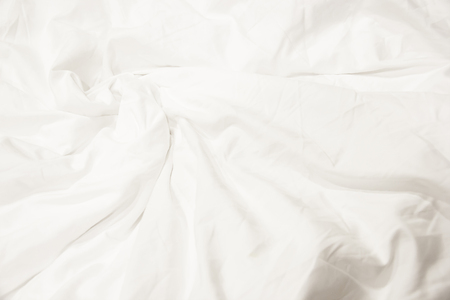 Close up of white bedding sheets and copy space.の写真素材