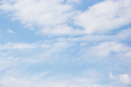 Blue sky background and white clouds soft focus.の写真素材