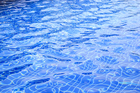 Abstract wave blue water in swimming pool for background.の写真素材
