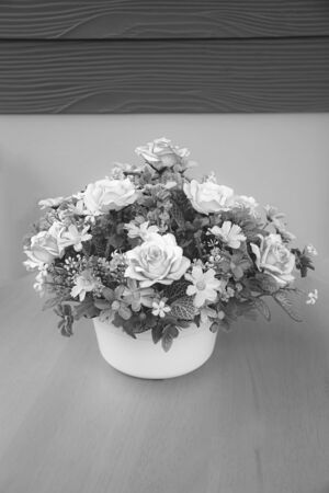 Rose bouquet on wood table gray color with copy-space, soft focus.の写真素材