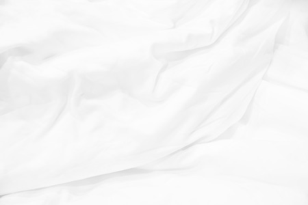 Close up of white bedding sheets and copy space.の写真素材