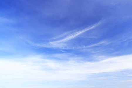 Soft white clouds against blue sky background and copy space.の写真素材
