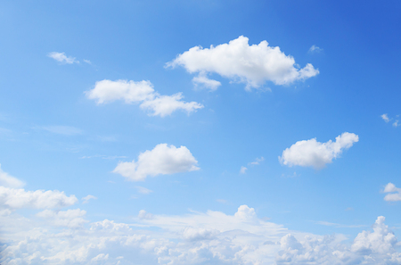 Blue sky background and white clouds soft focus, and copy space.の写真素材