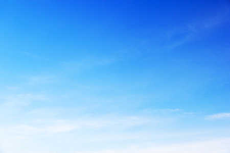 Blue sky background and white clouds soft focus, and copy space.の写真素材