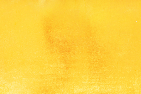 Gold abstract background or texture smooth and gradients shadow. Soft focus.の写真素材