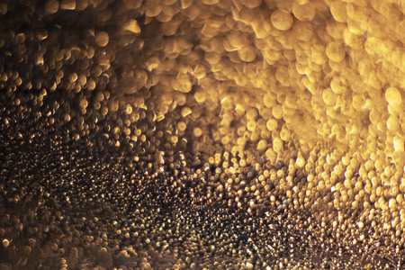Gold sparkle glitter for Christmas background.の写真素材