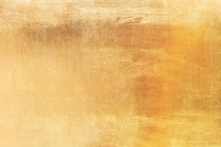 Gold grunge abstract background or texture and gradients shadow.の写真素材