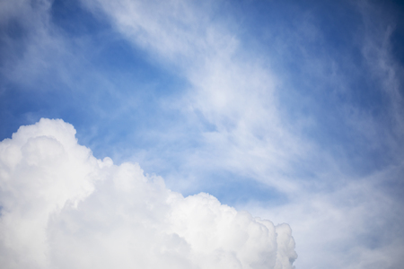 Blue sky background and white clouds soft focus, and copy space.の写真素材