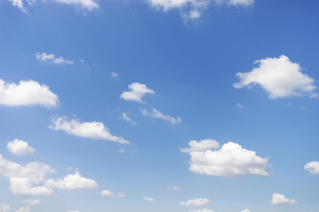 Blue sky background and white clouds soft focus, and copy space.の写真素材