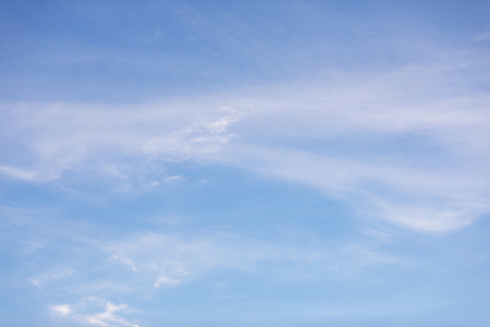 Fantastic soft white clouds against blue sky in twilight timeの写真素材