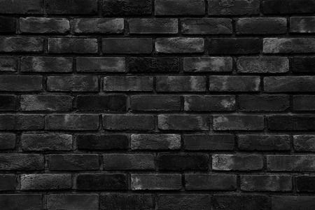 Black brick wall as a background or texture.の写真素材