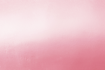 Pink metal rose gold tone background or texture and gradients shadow for valentines.の写真素材