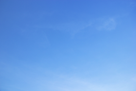 Fantastic soft white clouds against blue skyの写真素材