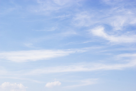 Fantastic soft white clouds against blue skyの写真素材
