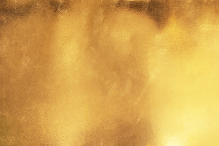 Gold abstract background or texture and gradients shadow.の写真素材