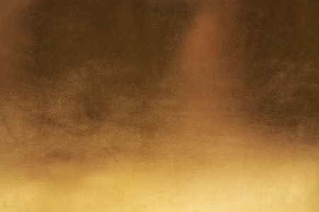 Gold abstract background or texture and gradients shadow.の写真素材