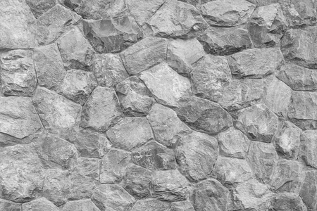 Gray stone wall as a background or textureの写真素材