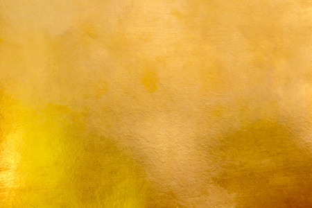 Gold abstract background or texture distress  scratch and gradients shadow.の写真素材