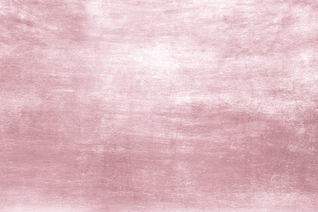 Pink metal rose gold tone background or texture and gradients shadow for valentines.の写真素材