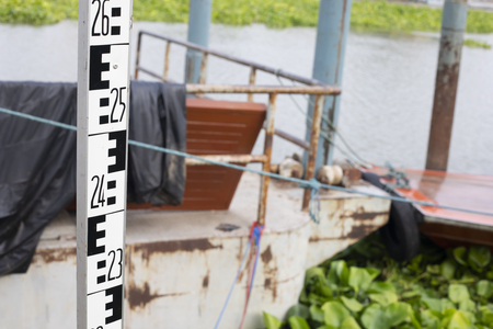 Staff aluminium for survey in river.の写真素材