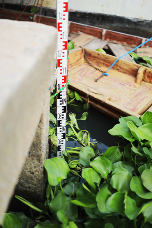 Staff aluminium for survey in river.の写真素材
