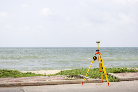 GPS surveying in field sea background, Global Positioning System.の写真素材
